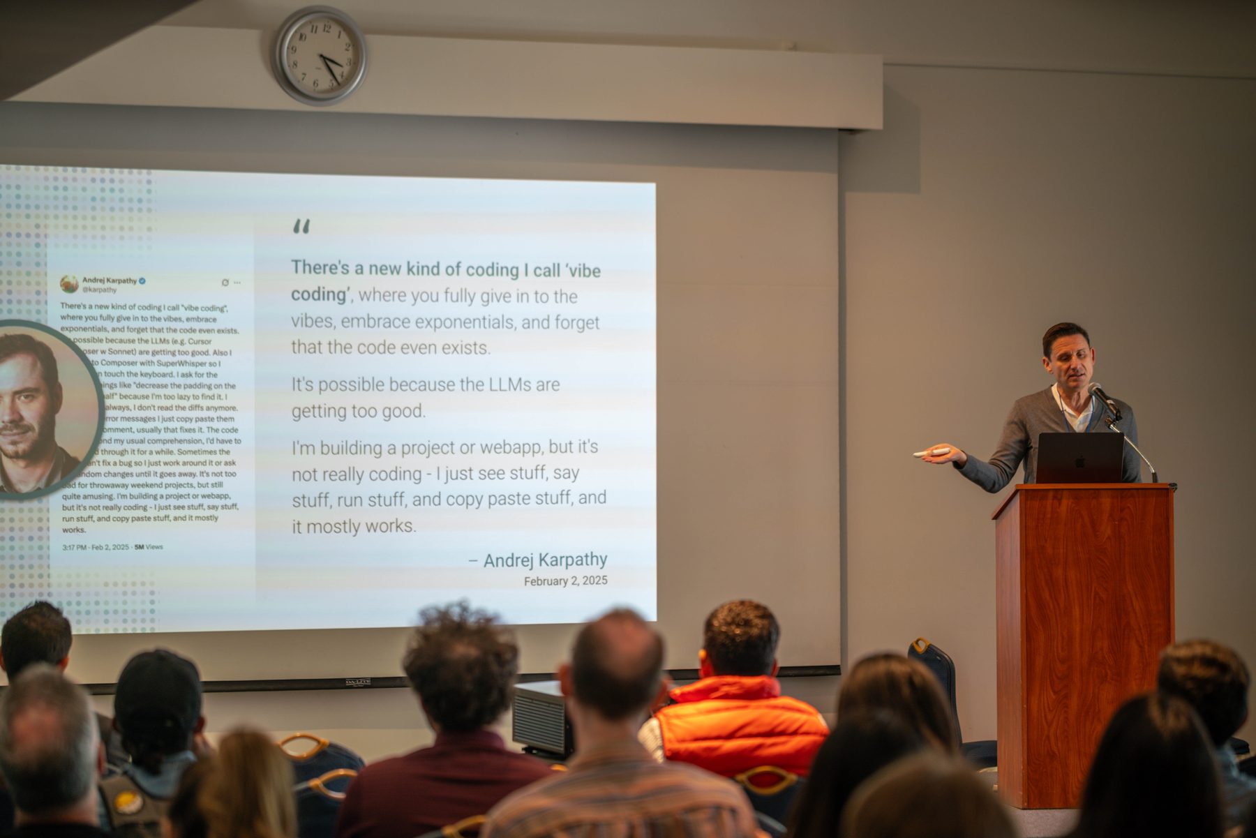 A keynote speaker at the podium in 2025